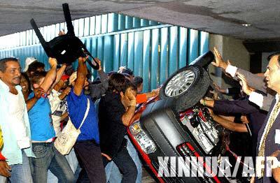 巴西農(nóng)民闖入議會 24人受傷300人被捕