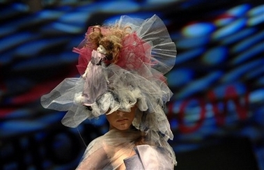 A model presents a millinery creation by Hungarian designer duo Aniko Nemeth and Timea Balak during the three-days Wella Fashion Show event in Budapest, Hungary Sunday, March 4, 2007.