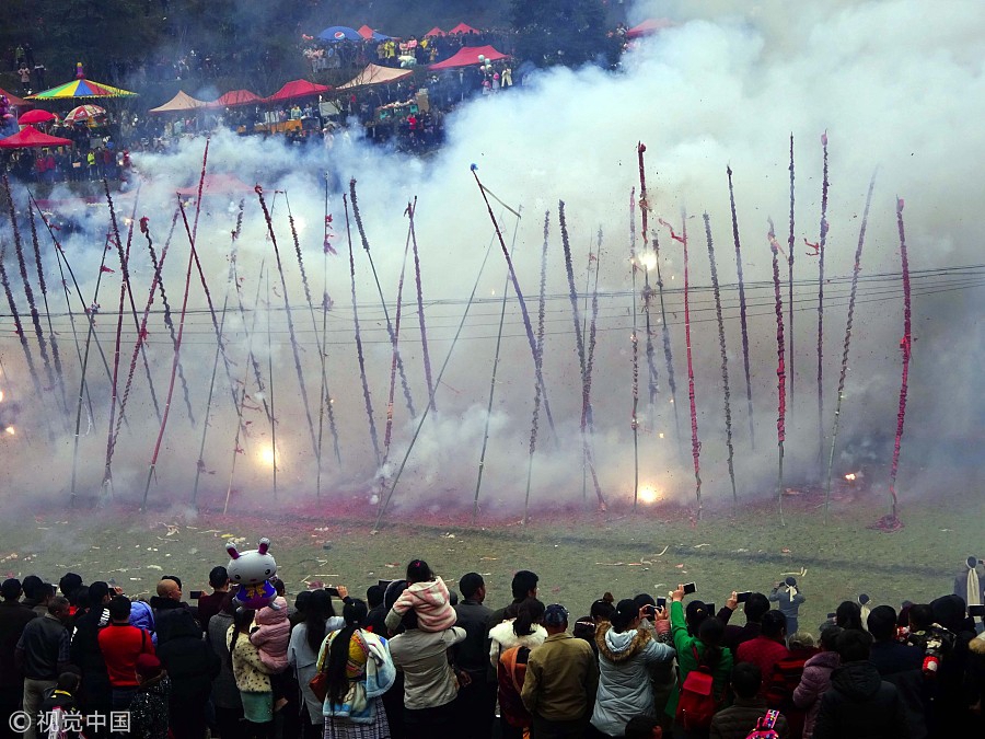 Miao people celebrate festival with millions of firecrackers