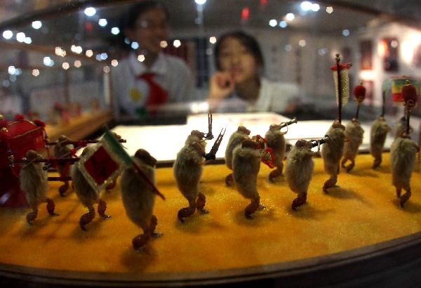 Intangible cultural heritage exhibition opens in Beijing prior to Children's Day