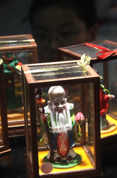 Intangible cultural heritage exhibition opens in Beijing prior to Children's Day